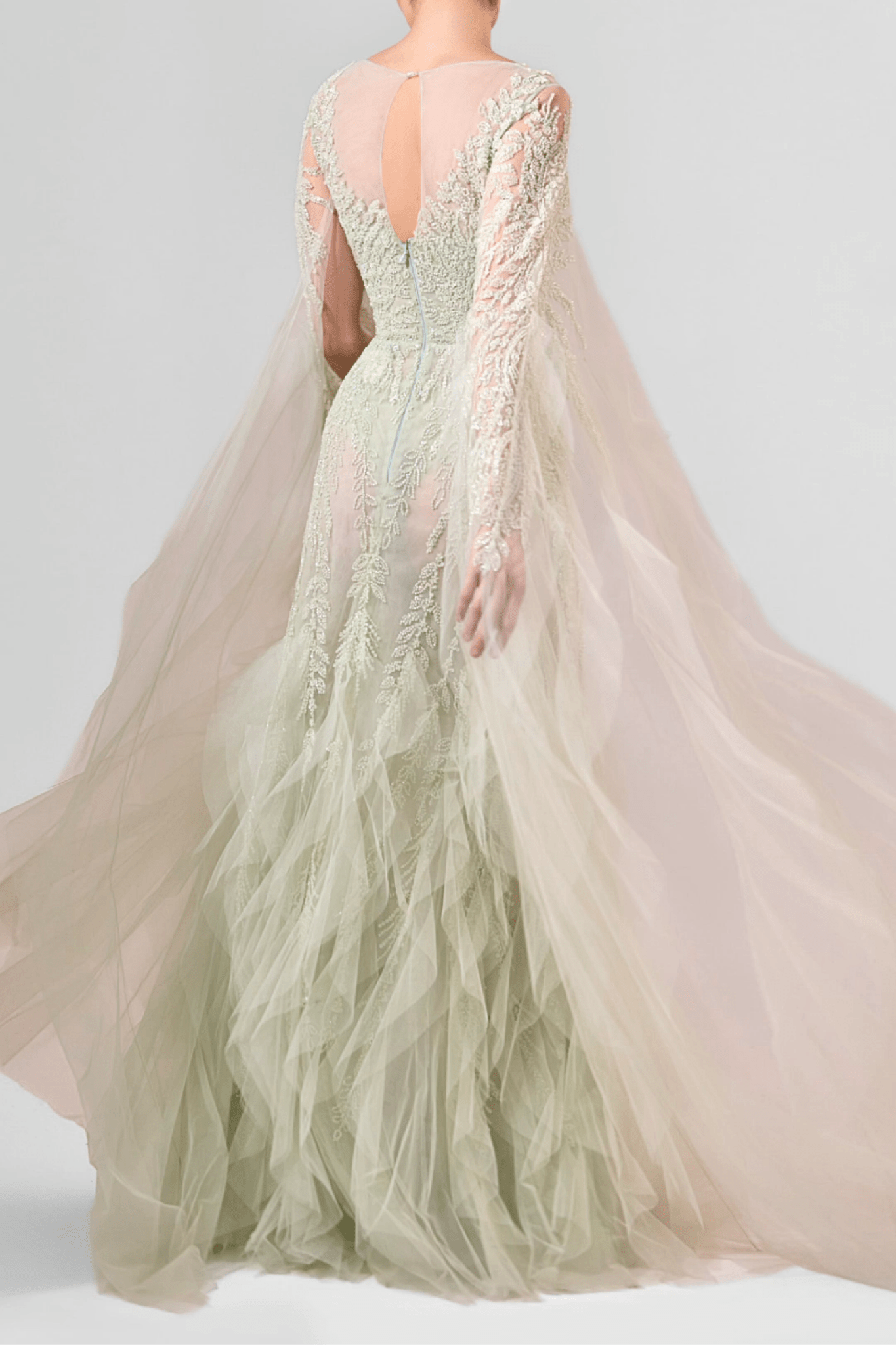 Sage Green Embellished Tulle Gown with Draped Cape Sleeves - ALBOUSHIYA - district 5 - dubai - riyadh - abaya - dresses - designers - evening wear - luxury - elegance - craftsmanship - gowns - cocktail dresses - collections - georges