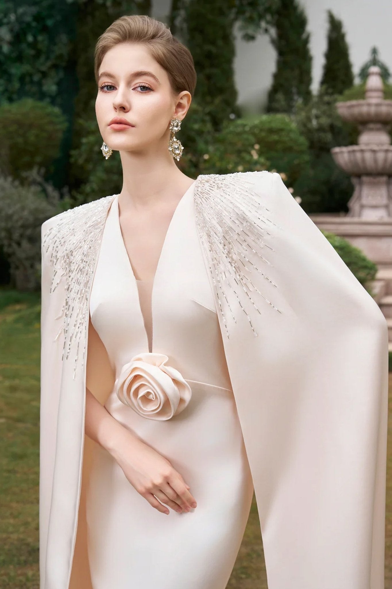 V - Neckline Sleeveless Gown With Long Cape - ALBOUSHIYA - district 5 - dubai - riyadh - abaya - dresses - designers - evening wear - luxury - elegance - craftsmanship - gowns - cocktail dresses - collections - georges