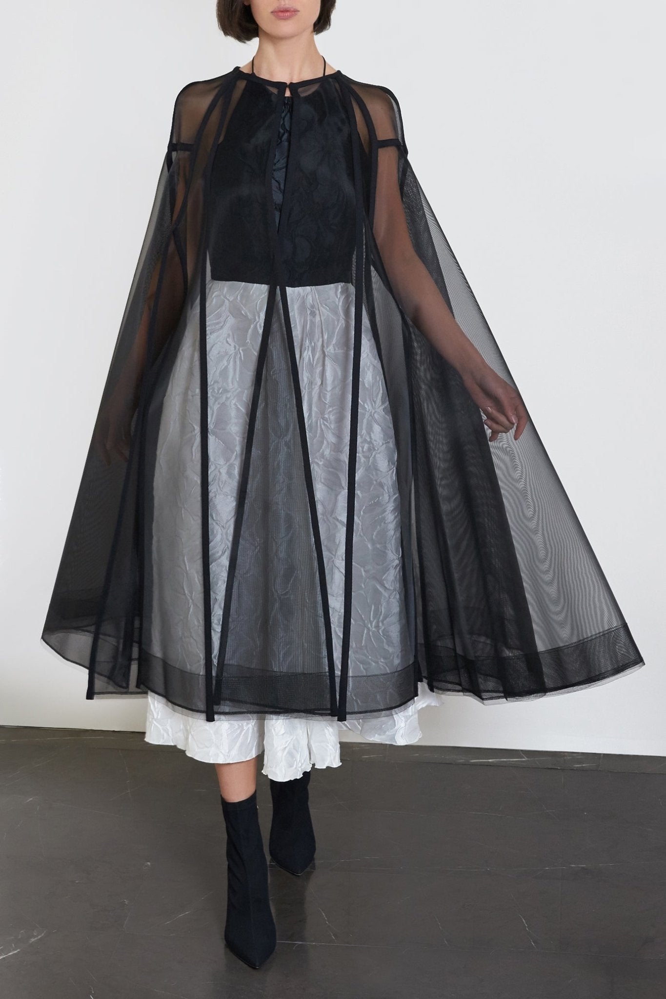 Campbell Cape - ALBOUSHIYA - district 5 - dubai - riyadh - abaya - dresses - designers - evening wear - luxury - elegance - craftsmanship - gowns - cocktail dresses - collections - georges