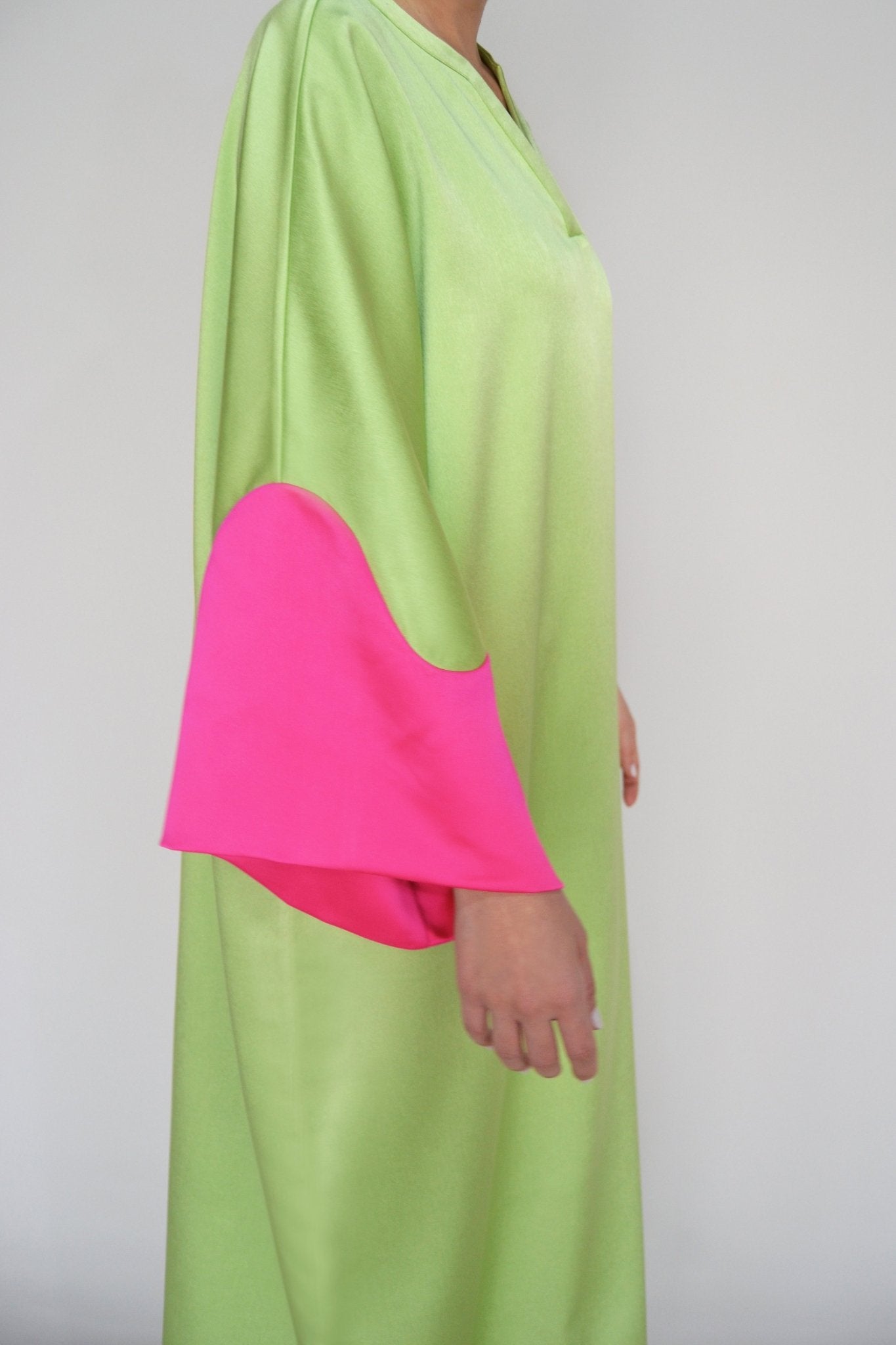 Pistachio Crepe Caftan with Fuchsia Satin Sleeves - ALBOUSHIYA - district 5 - dubai - riyadh - abaya - dresses - designers - evening wear - luxury - elegance - craftsmanship - gowns - cocktail dresses - collections - georges